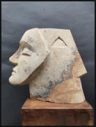 Christine Dewerny I Bildhauerin I Berlin I Sandsteinskulpuren I Masekerade II I Postaer Sandstein